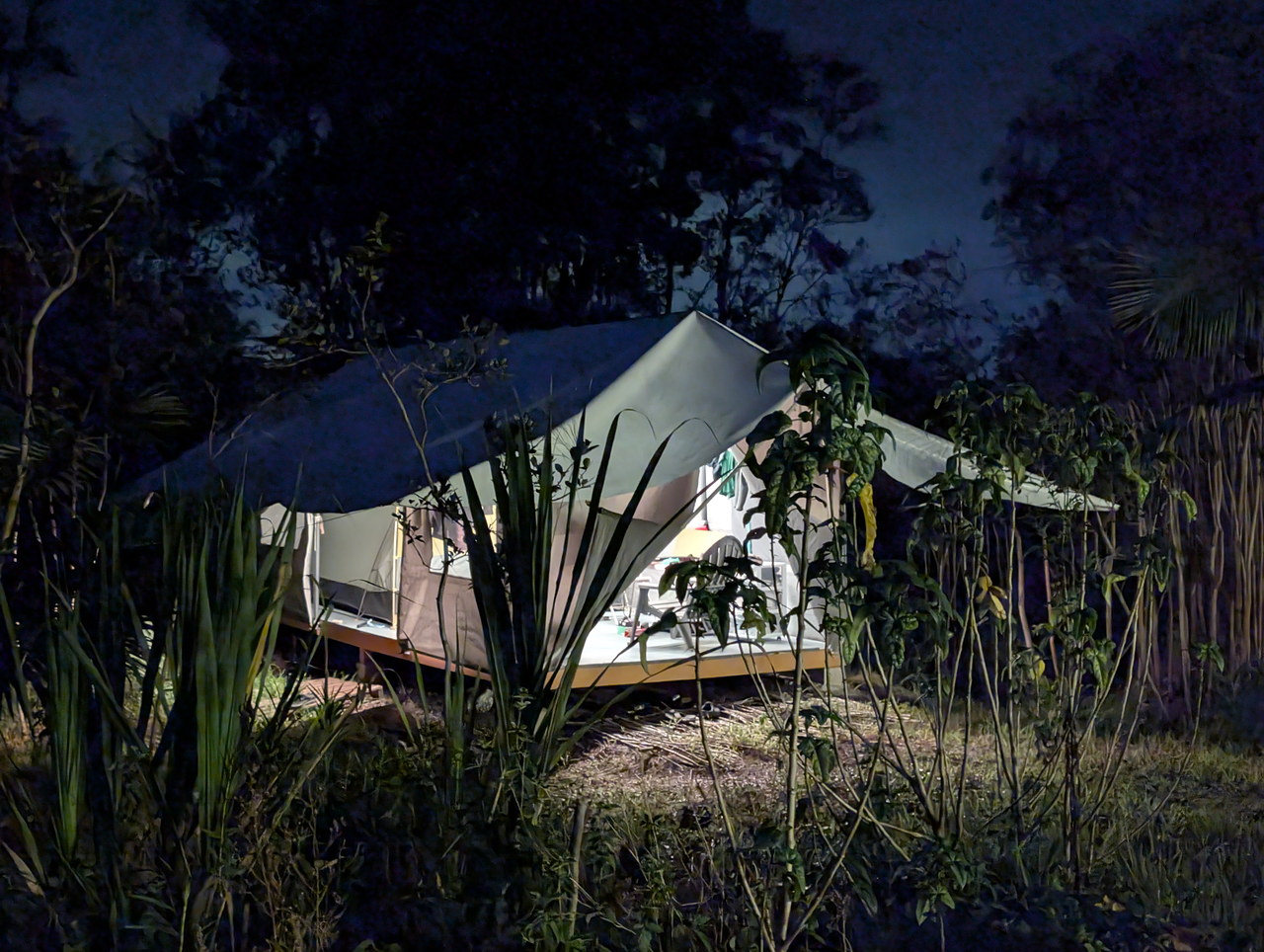 Placeholder — camp under tarp and jungle canopy